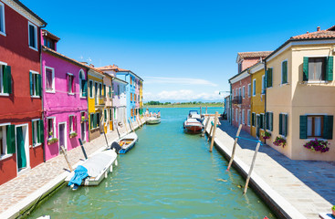 Canal and colorful buildings in Burano island, Venice, Italy