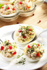 stuffed eggs with ham, red pepper and dill