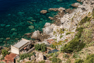 Rocky coastline near Palmi, in Calabria (region of southern Italy) - obrazy, fototapety, plakaty