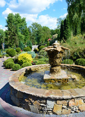The original decorative fountain in a botanical garden