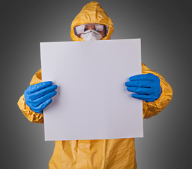 Scientist with protective hazmat suit
