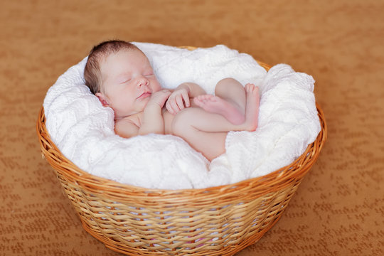 Caucasian newborn baby while sleeping closeup