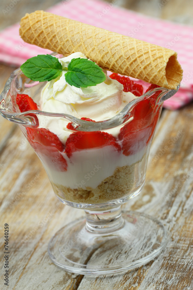 Wall mural sundae dessert with strawberries and whipped cream