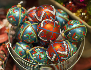 Colorful collection of Christmas Balls in basket.