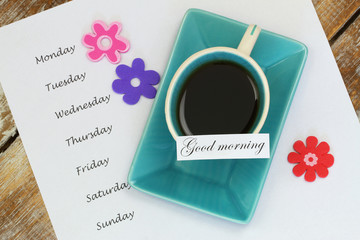 Good morning card with cup of tea and days of the week on paper