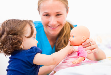 Adorable baby and babysitter