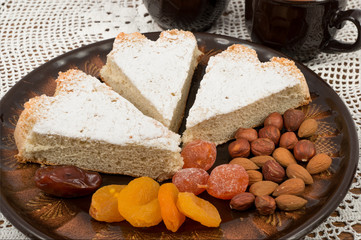 Sponge cake and dried fruit on a plate