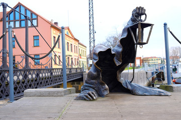 statue of the creeping ghost on the embankment of Klaipeda, Lith
