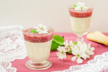 White chocolate dessert with strawberries in glass