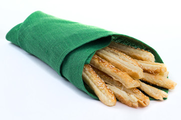 Sticks of puff pastry in a napkin