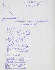 Squared paper with mathematical formulas © geniuskp