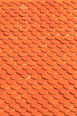 Orange roof tiles of a old built house