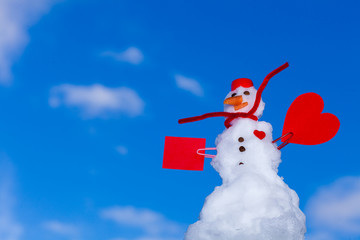 Little happy snowman red heart paper card outdoor. Winter.