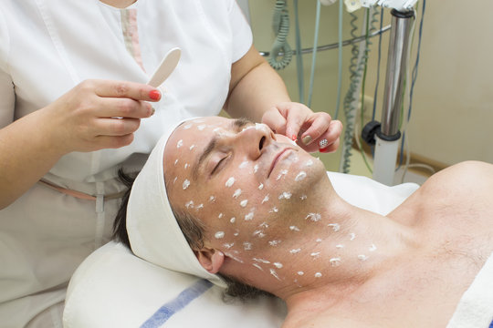 man in a beauty salon facial and massage
