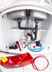 Plumber tools on the kitchen.