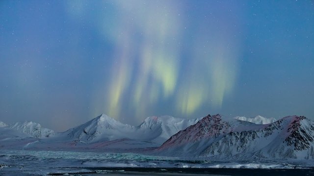 Arctic mountain landscape with Northern Lights