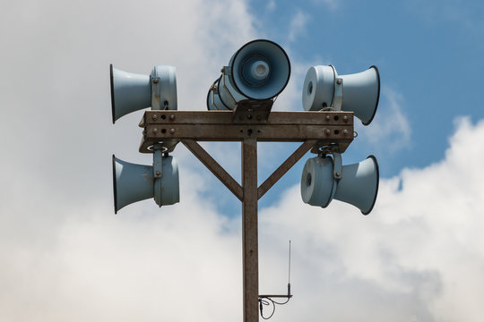 set of megaphones on pole