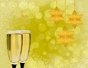 glasses with champagne and snowflakes