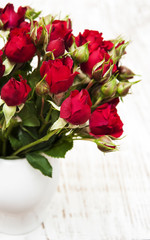 Red roses in vase