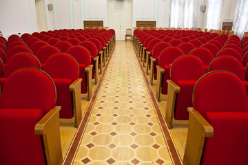 Empty conference hall. red chair