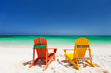 Colorful lounge chairs at Caribbean beach