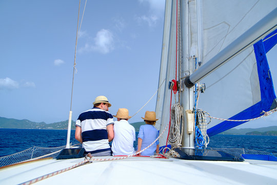 Family sailing on a luxury yacht