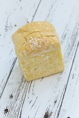 moldy bread on white table wood