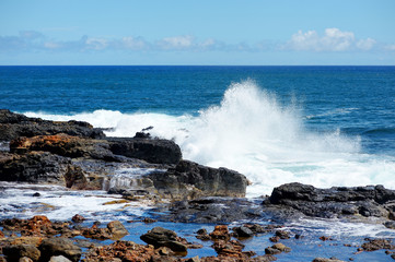 Ocean waves crashing on rocks