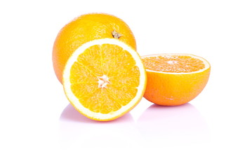 Fototapeta premium sliced ripe appetizing orange isolated on a white background wit
