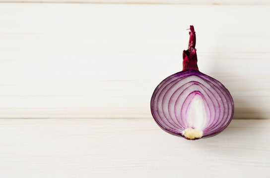 half a red onion on table
