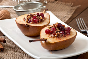 Baked pears with cranberries, honey and walnuts