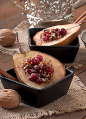 Baked pears with cranberries, honey and walnuts