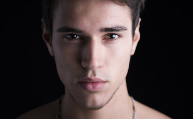 Obraz premium Closeup headshot of handsome young man