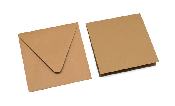 brown envelope with a blank card over white
