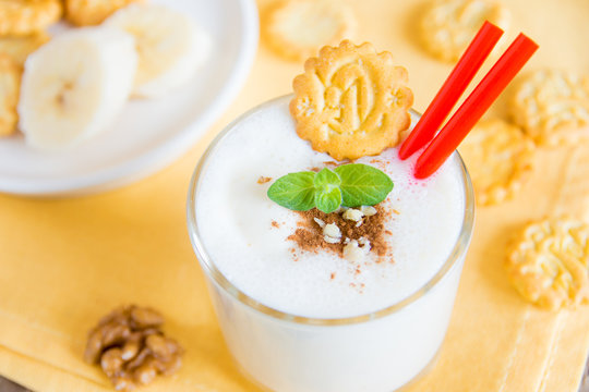 Milkshake (banana smoothie) with mint, nuts and cookies