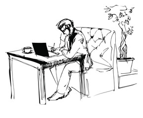 young businessman working in a cafe