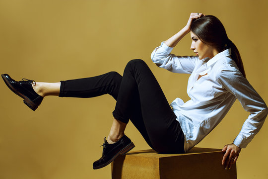 Female beauty concept. Portrait of fashionable young girl in cla