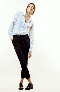 Female beauty concept. Portrait of fashionable young girl in cla
