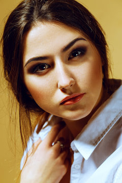 Female beauty concept. Portrait of fashionable young girl in cla