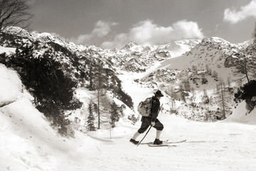 Black and white photos, Skier with vintage skis - 74682485