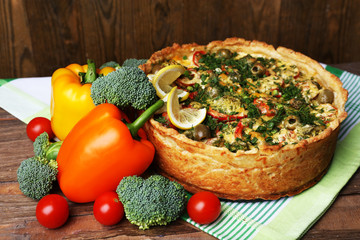 Vegetable pie with broccoli, peas, paprika, tomatoes and cheese