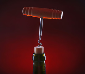 Bottle opener close-up, on dark color background