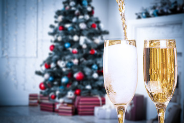 Two Champagne Glasses On Defocused Background Living Room