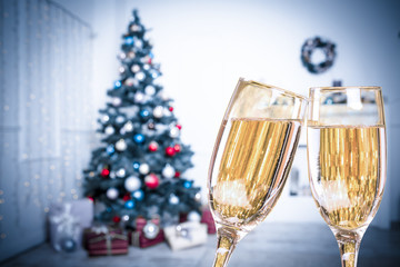 Two Champagne Glasses On Defocused Background Living Room