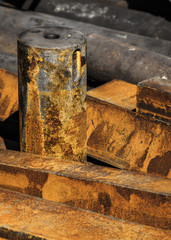 Old, rusty and colorful iron parts of machines on the Scrapyard