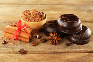Chocolate cookies with bowl of cocoa and cinnamon