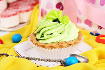 Sweet cakes on birthday table close-up