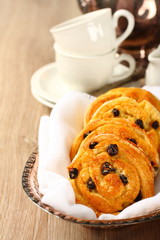 Fresh gluten free sweet swirl buns with raisins