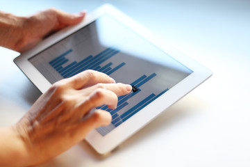 Businesswoman holding digital tablet