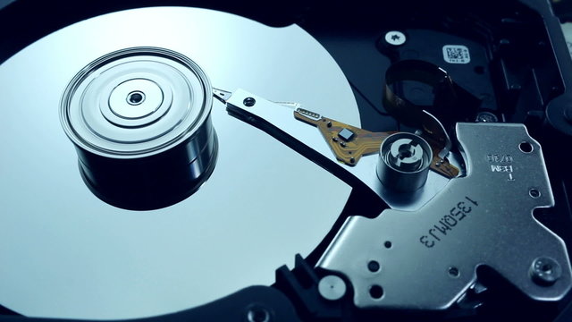 Dolly shot of Hard disk drive with spinning platter